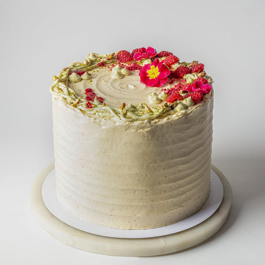 Pistachio, Rose & Cardamom Cake With Hibiscus Curd, Raspberry Compote & Rose Buttercream